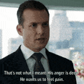 a man in a suit and tie is saying that 's not what i meant