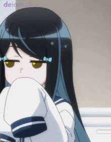 a picture of a girl with long black hair and the words deiostudio on the bottom