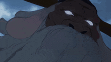 a cartoon drawing of a rabbit with red eyes