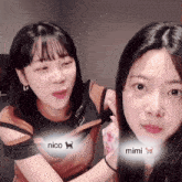 two girls are sitting next to each other with nico and mimi written on their chests