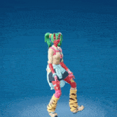 a cartoon character with green hair and a red face