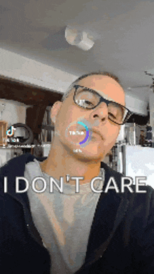a man wearing glasses says i don t care