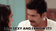 a man and woman are looking at each other and the man is saying i am sexy and i know it