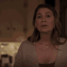 a woman says " you can " in front of a kitchen
