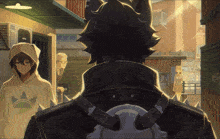 a man in a hoodie with the word adidas on it stands in a narrow alleyway