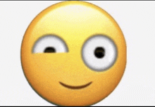 a close up of a yellow smiley face with white eyes and a smile on it .