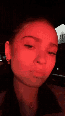Bianca Finch Red Light On Face GIF - Bianca Finch Red Light On Face Serious Look GIFs