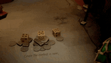 a game is being played on a table with the words " the crew with the most silver will be victorious " on it