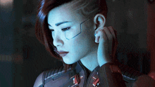 Disconnecting The Device Behind The Ear Cyberpunk 2077 Phantom Liberty GIF - Disconnecting The Device Behind The Ear Cyberpunk 2077 Phantom Liberty Detaching The Device GIFs