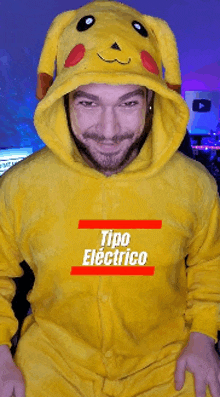 a man is wearing a pikachu costume with the words tipo electrico on the front