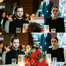 a man and a woman sit at a table with candles