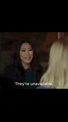 a woman says they 're unavailable while looking at a man