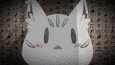 a drawing of a rabbit with a face on a wall with chinese writing