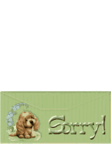 a green envelope with a picture of a dog and the word sorry on it