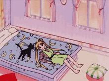 a girl in a green dress is standing on a bed