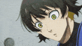 a close up of a person 's face with their eyes wide open