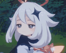 a girl with white hair and a blue star on her head