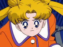 a close up of a girl 's face with the letter o on her forehead