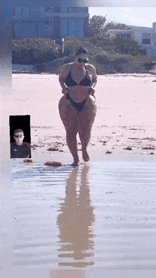 a woman in a bikini is standing in the water on the beach
