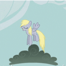 a black and white pony with a yellow mane and tail is standing on a cloud