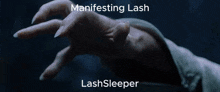 a man with a beard is holding a sphere with the words manifesting lash lashsleeper written below him