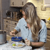 Blowing On Food Jill Dalton GIF - Blowing On Food Jill Dalton The Whole Food Plant Based Cooking Show GIFs