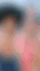 a painting of a person 's face with a pink and blue background