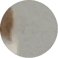 a pixelated image of a circle with a few dots on it