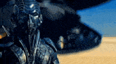 a man in a futuristic suit with a mask on