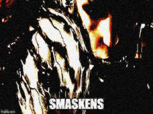 a close up of a person 's face with the words `` smashens '' written on the bottom .