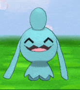 a blue cartoon character with a mustache is sitting on a green field