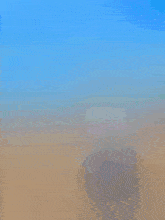 a man standing on a beach with the words assalamu ' alaikum wr wb written above him