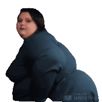 a woman in a blue shirt is being made with unscreen
