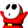 a shy guy from super mario bros is wearing a red costume and a white mask .