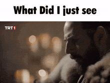 a man with a beard is looking down with the words what did i just see below him
