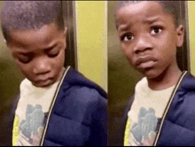 a young boy is standing in an elevator and making a sad face .