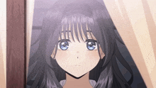 a girl with long black hair and blue eyes is looking out a window