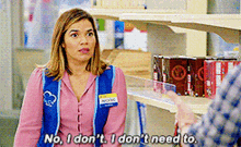 a woman in a blue vest says no i don 't i don 't need to .