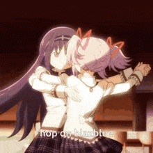 a couple of anime girls hugging with the words hop on blazblue in the corner