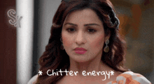 a close up of a woman 's face with the words * chitter energy * written below her