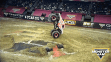 a monster jam event is taking place in front of a crowd