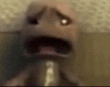a close up of a person 's face with their mouth open