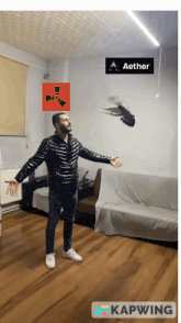 a man throws a pigeon in the air with aether written on the bottom