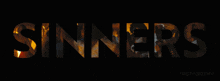 the word sinners is displayed on a dark background