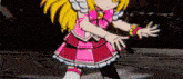 a cartoon girl in a pink and red dress is dancing