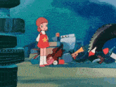 a girl in a red dress with a yellow star on it stands in front of a pile of tires