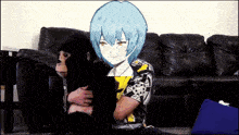 a girl with blue hair is holding a stuffed animal in front of a couch
