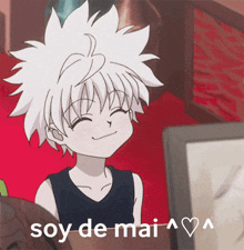 a boy with white hair is smiling with the words soy de mai written below him