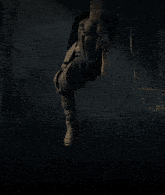 a man in a kimono is wearing a mask