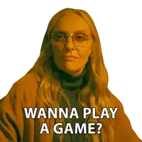 a woman wearing glasses and a sweater says wanna play a game